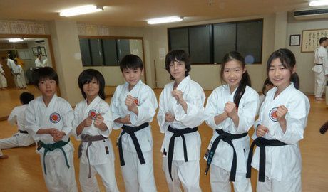 Sam at the karate dojo in Tokyo with his new friends. A wonderful end to a wonderful trip.